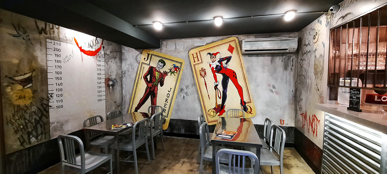 Murales de Harley Quinn y el Joker en Comic Planet.